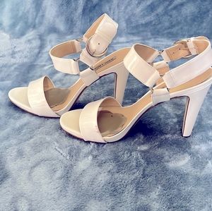 White patent leather  Karl Lagerfeld heels  with gold accent.  Size 9